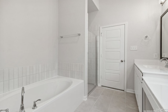 bathroom with vanity, separate shower and tub, and tile patterned floors