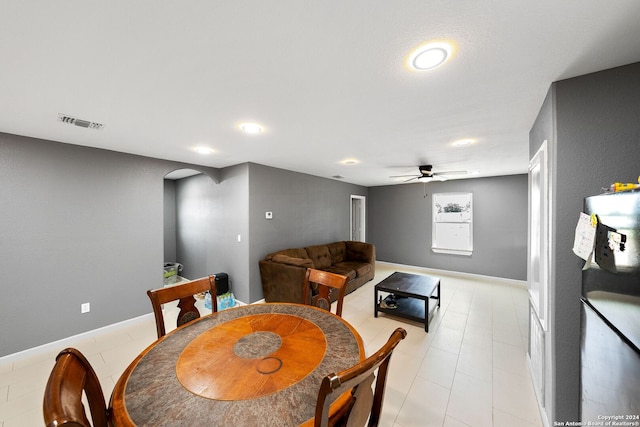 dining area with ceiling fan