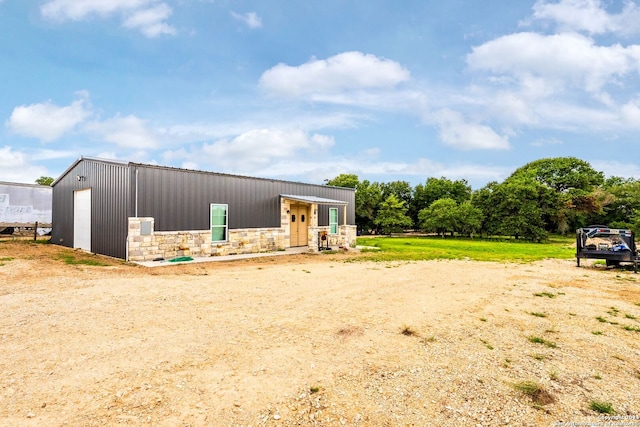 view of outbuilding featuring a garage