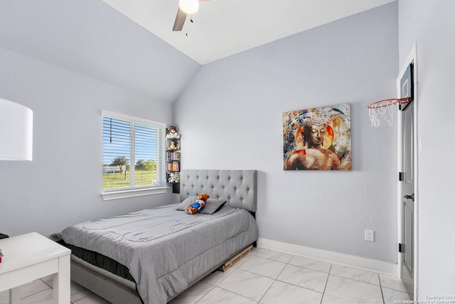 bedroom with ceiling fan and lofted ceiling