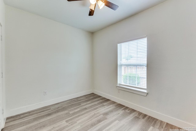 spare room with ceiling fan and light hardwood / wood-style flooring