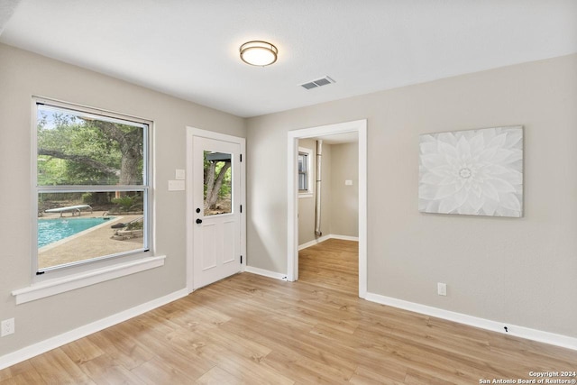 entrance foyer featuring light wood-type flooring