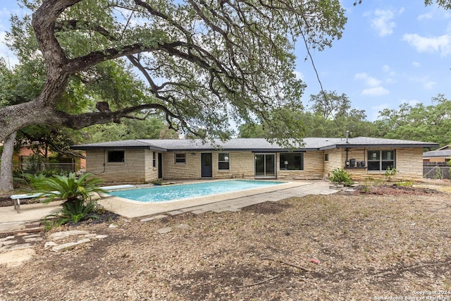 rear view of house with a patio area