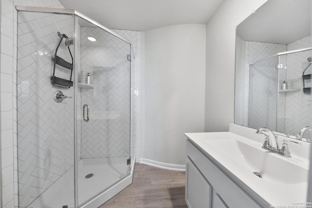 bathroom featuring vanity and walk in shower