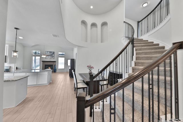 stairway with a high ceiling