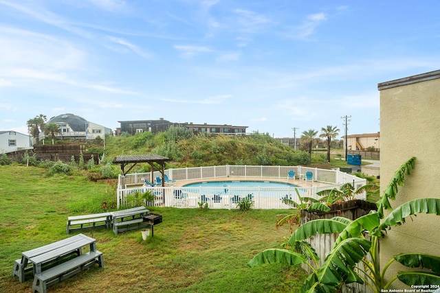 view of pool featuring a gazebo and a lawn