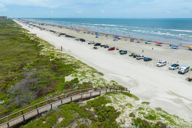 bird's eye view with a water view and a view of the beach