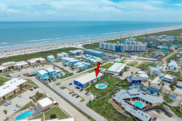 aerial view with a beach view and a water view