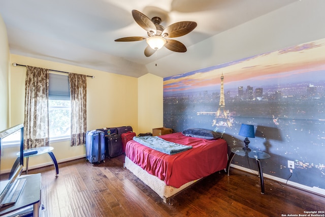 bedroom featuring ceiling fan and hardwood / wood-style flooring