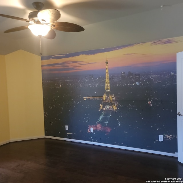 unfurnished room with ceiling fan and hardwood / wood-style floors