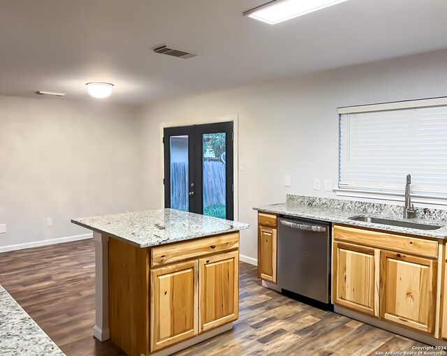 laundry room featuring hookup for a washing machine, gas dryer hookup, and dark hardwood / wood-style flooring