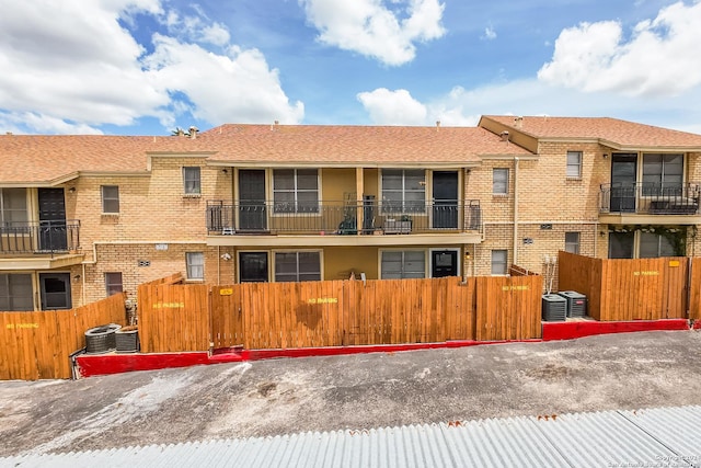 view of front of property with cooling unit