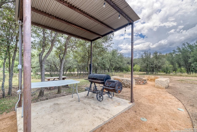 view of patio with a grill