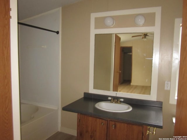 full bathroom with tub / shower combination and vanity