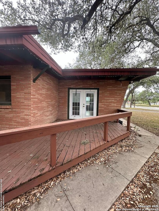 wooden deck with french doors