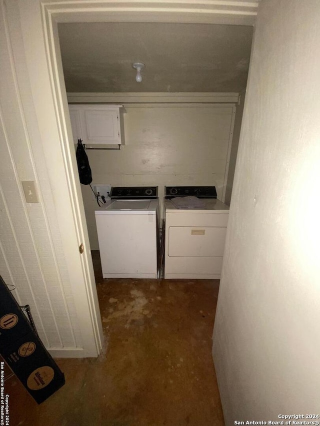 clothes washing area featuring independent washer and dryer