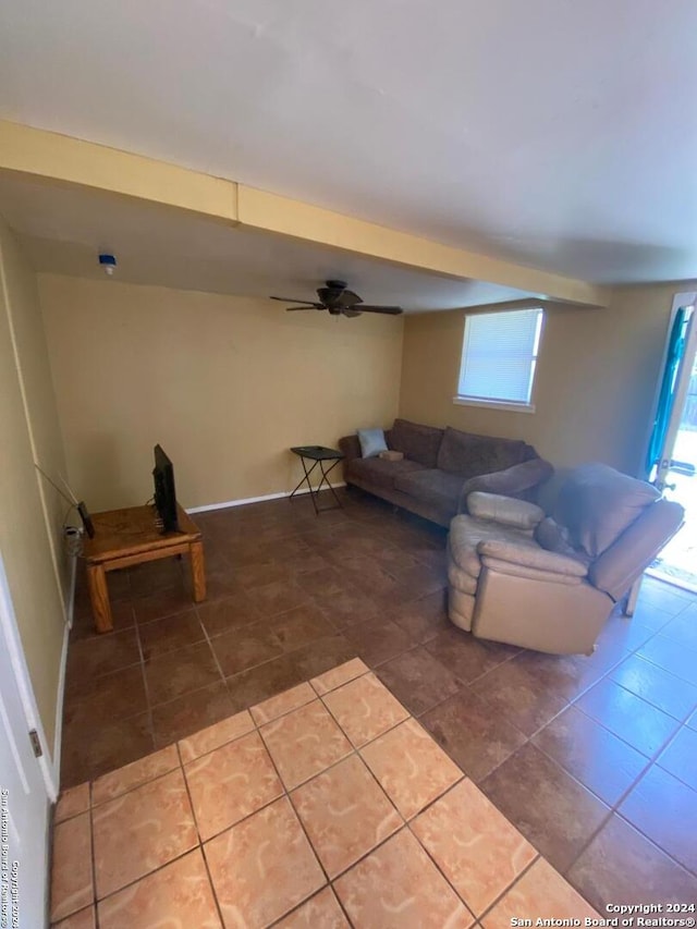 living room with tile patterned flooring, plenty of natural light, and ceiling fan