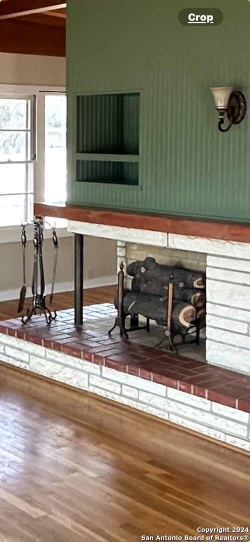 interior details featuring wood-type flooring