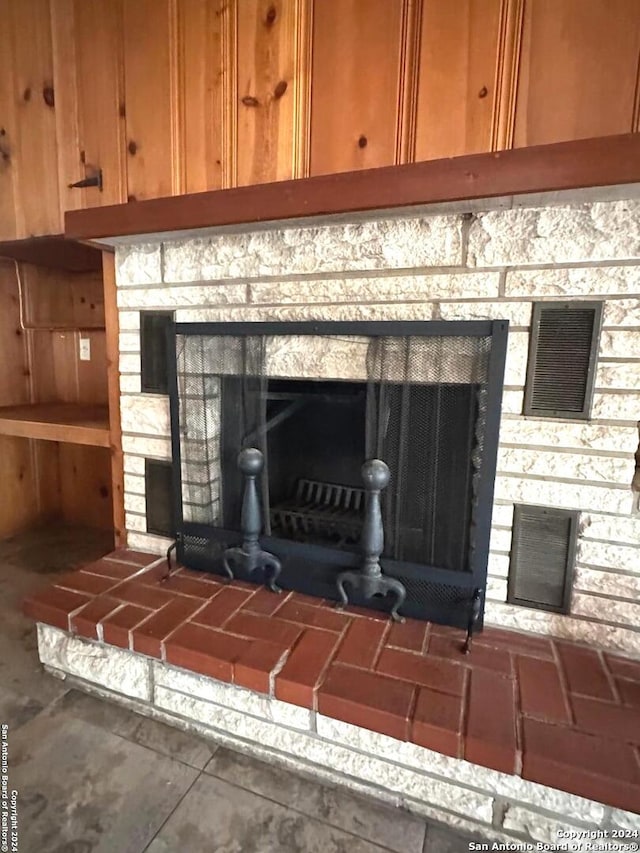 details featuring a stone fireplace