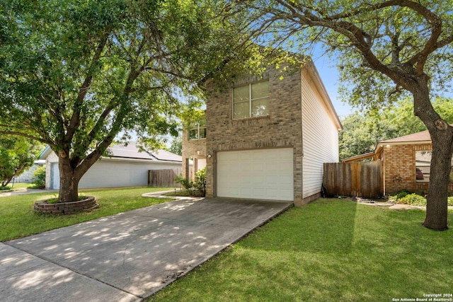 view of front of house featuring a garage and a front lawn