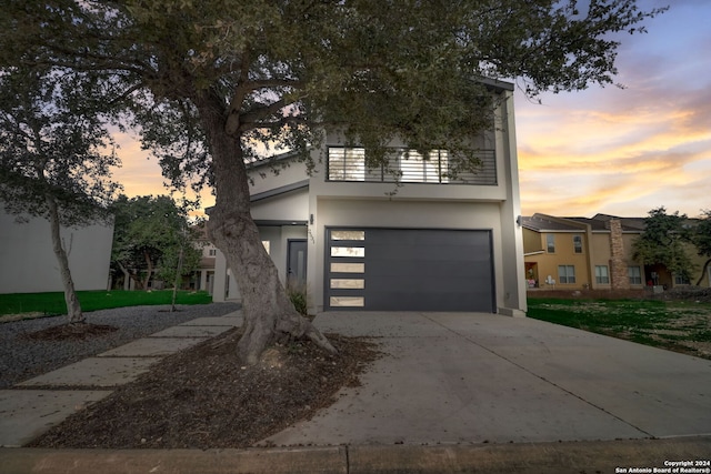 view of front of property with a garage