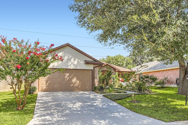 ranch-style house featuring a front lawn, concrete driveway, brick siding, and an attached garage