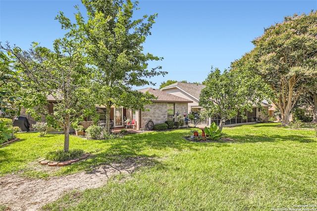 view of front of house with a front yard