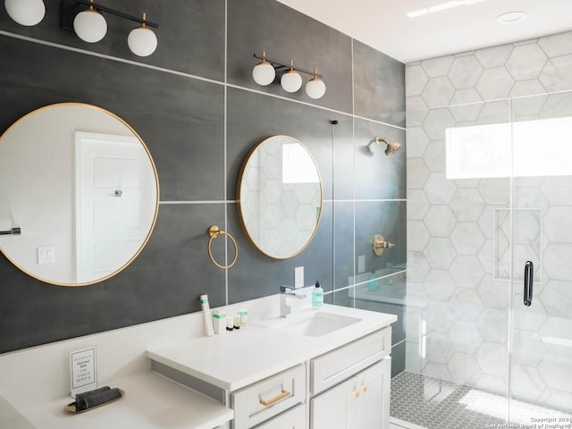 bathroom with vanity and an enclosed shower