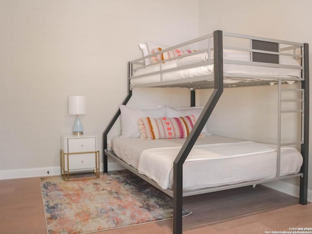 bedroom featuring hardwood / wood-style flooring