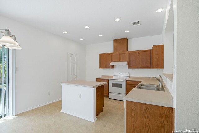 kitchen with decorative light fixtures, white electric range, sink, a center island, and light tile patterned floors