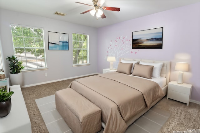 carpeted bedroom featuring ceiling fan