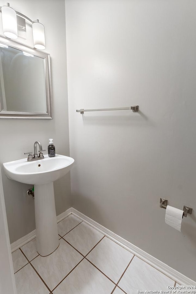 bathroom with tile patterned flooring