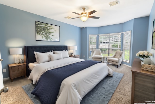 carpeted bedroom featuring ceiling fan