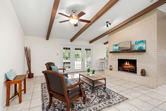 tiled living room with a fireplace, french doors, vaulted ceiling with beams, and ceiling fan