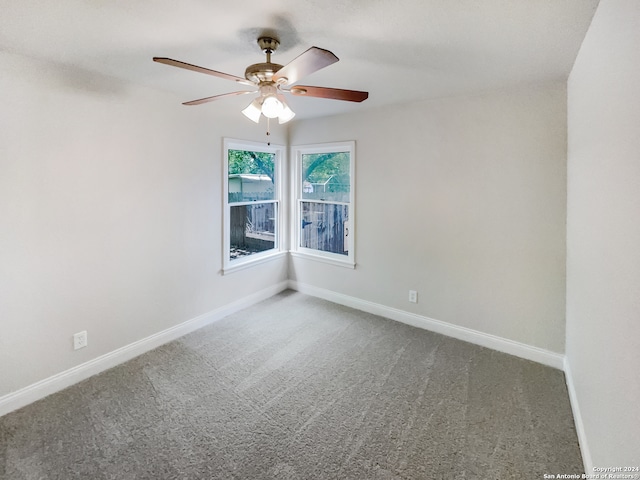 unfurnished room with carpet floors and ceiling fan