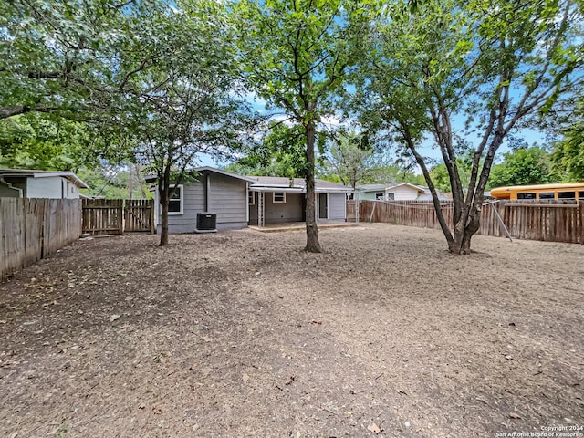 view of yard with central AC unit