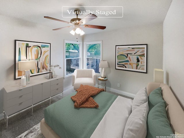 carpeted bedroom with ceiling fan