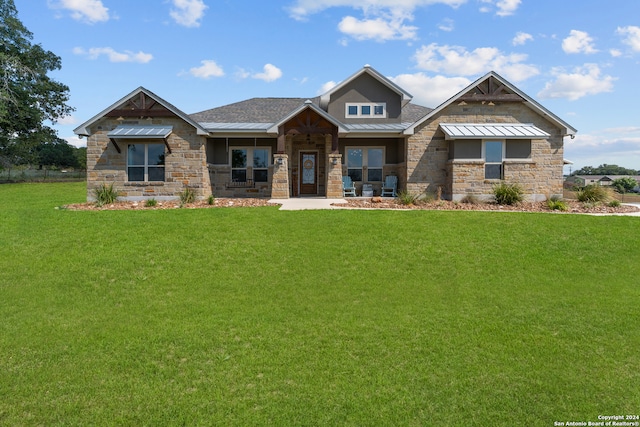 craftsman house with a front lawn