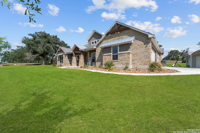 craftsman-style home with a garage and a front yard