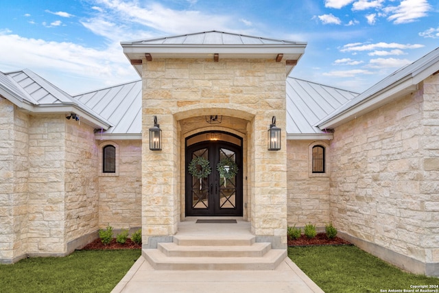 view of exterior entry with french doors