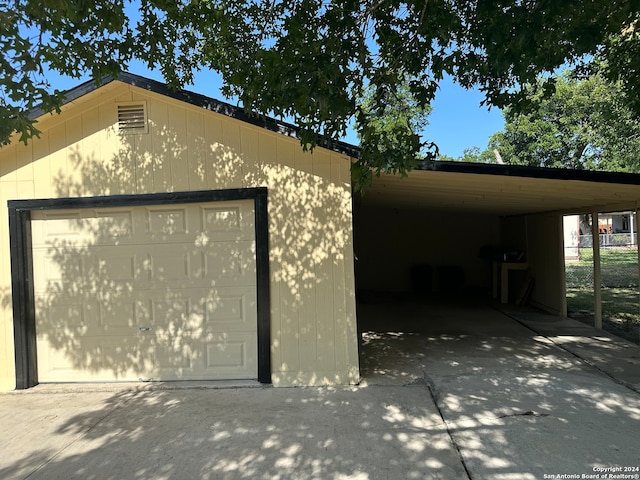 exterior space with a carport