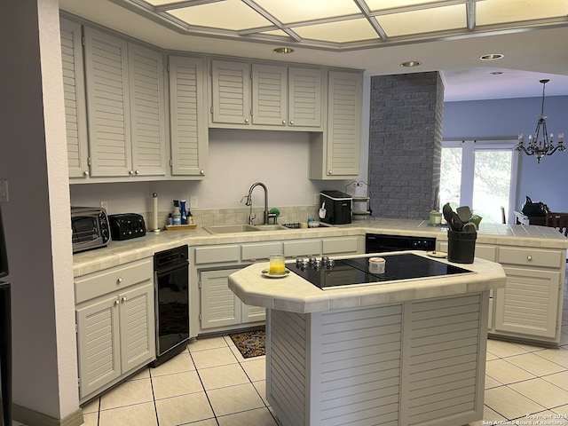 kitchen with tile countertops, black electric stovetop, light tile patterned flooring, and a sink