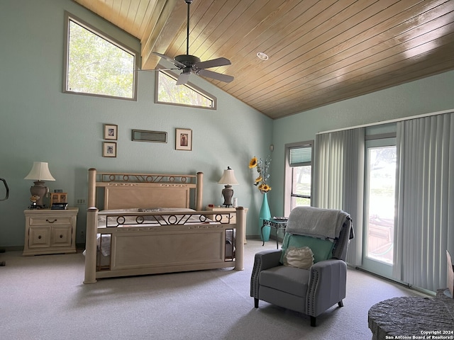 bedroom featuring baseboards, wood ceiling, ceiling fan, vaulted ceiling with beams, and carpet