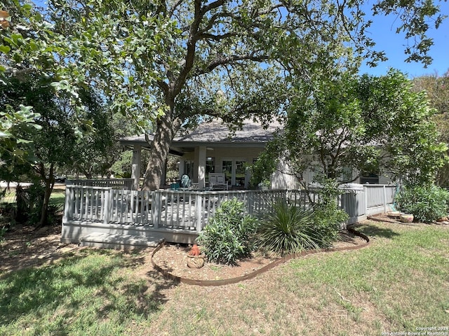 view of yard with a wooden deck