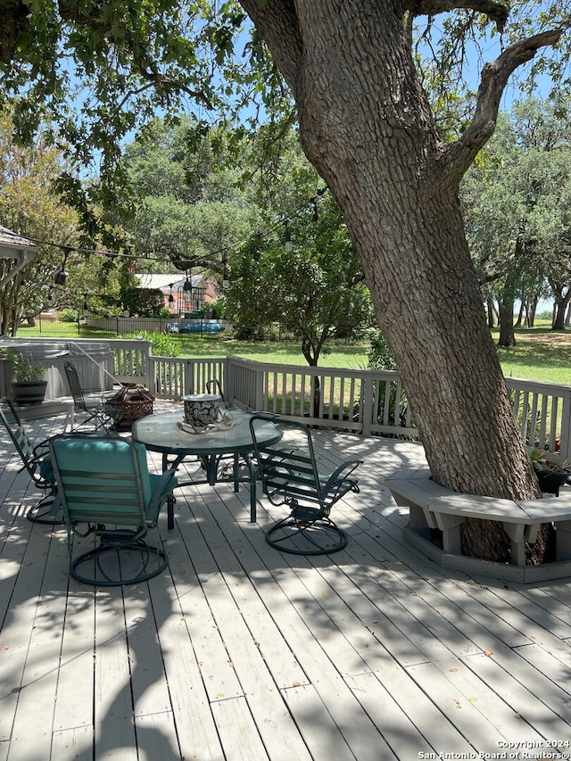 deck featuring an outdoor fire pit