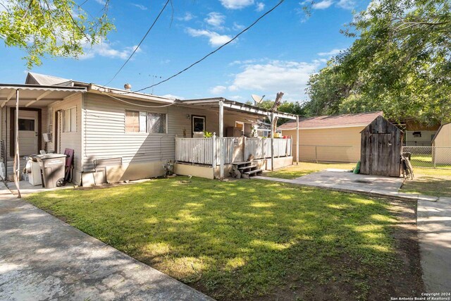 view of yard with a patio area and a shed