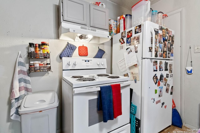 kitchen featuring white appliances