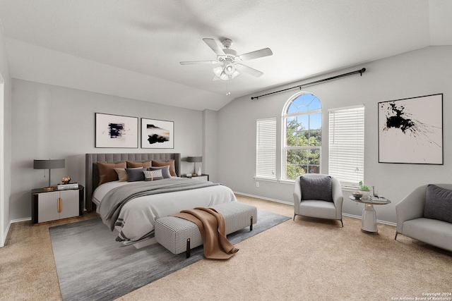 bedroom featuring lofted ceiling, carpet, and ceiling fan