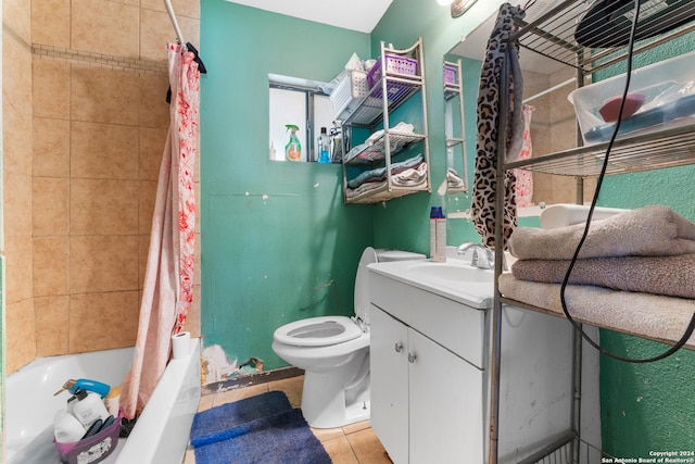 full bathroom with tile patterned floors, vanity, shower / tub combo, and toilet