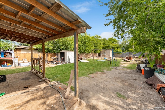 view of patio / terrace with a storage shed